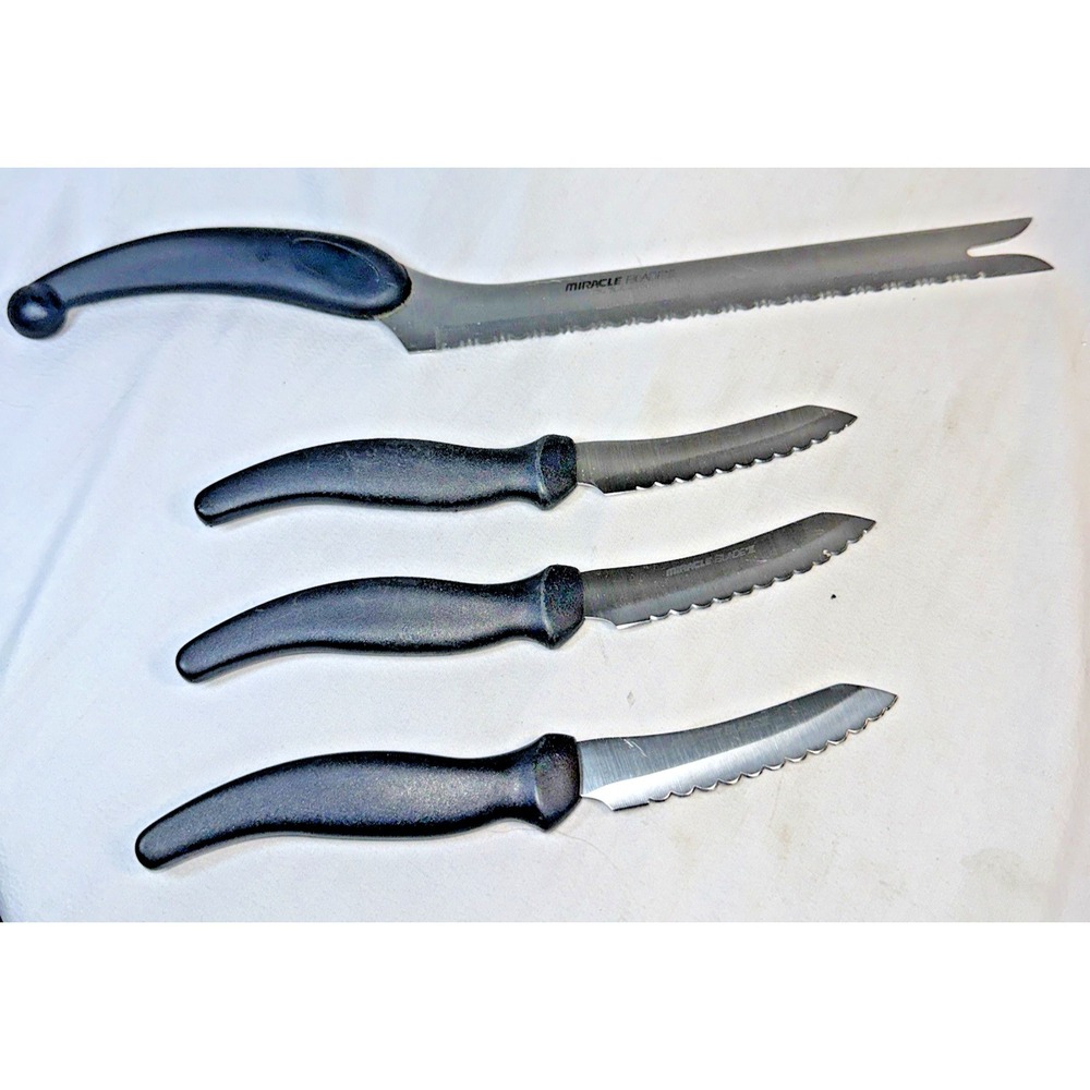 Set of 4 Miracle Blade III Stainles Steel Knives: 3 - 8" steak knives and 1 15in